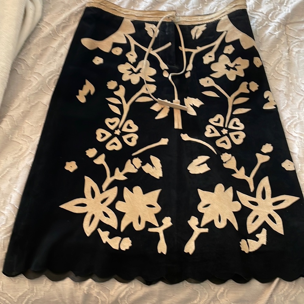 Unique leather pencil skirt by MODA International, size 4.